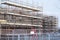 Building affordable homes with scaffolding safety by local construction council to help government social housing problem and shor