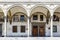 Building with arches along the Piazza della Santissima Annunziata square in Florence, Tuscany, Italy