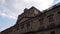 Building with baroque architecture from Mexico City under slightly cloudy sky