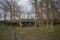 Building with beehives in a grass field