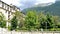 Building below a wooded slope at the base of Mont Blanc