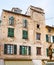 The building with bullet holes in Place Gaffori square, Corte, Corsica, France