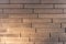 Building cladding with a ventilated facade, wooden texture, gray wood pattern