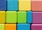 Building with Colors: Stacked Multi-Colored Wooden Blocks Inspiring Creativity and Cognitive Development