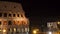 The building of the Colosseum and the Arch of Constantine in Rome at night