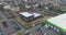 Building construction aerial view. Excavator on a construction site, workflow at a construction site, people work on a