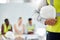 Building, construction and maintenance man employee holding a safety helmet. Construction worker ready to start working