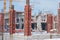 Building construction site with scaffolding under the snow