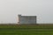 Building of edible Swiftlet bird's nests to attract birds to come and breed at the middle of paddy field.