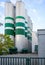 The building of the Eichbaum brewery with silos and flags