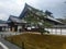 Building at the entrance Chumon Gate is labeled Shakyo at Kinkaku-ji, KYOTO, JAPAN