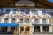 Building facade of birth house of Ludwig Thoma with Lueftlmalerei mural paintings Bavarian three dimensional painted frescoes.