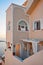 Building in Fira at sunset, Santorini, Greece