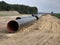 Building a gas pipeline between Russia and Western Europe.