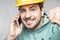 A building investor enjoys success during telephone negotiations