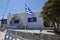 Building With Its Typical Blue Doors And Windows In Ano Mera On The Island Of Mykonos. Architecture Landscapes Travels Cruises.