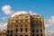 The building of Lonja del Comercio, stock exchange, now the offices of foreign companies. Topped with a statue of mercury, the God