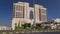 Building of luxurious 5-star hotel in Ajman timelapse hyperlapse nestled near the turquoise waters of Arabian Gulf.