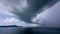 Building motions storm clouds.Dark clouds sky time lapse. Raining storm clouds over sea. Cloudscape timelapse Abstract background