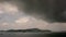 Building motions storm clouds.Dark clouds sky time lapse. Raining storm clouds over sea. Cloudscape timelapse Abstract background