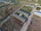 The building of an old farm for cattle. Top view of the farm. Storage of bales of hay on the old farm