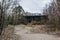 building overgrown with trees in Pripyat, the Chernobyl zone