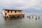Building partially submerged because of rising level of Atitlan lake in San Pedro La Laguna village, Guatema