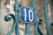 Building`s private entry with number ten