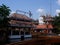 building with sculptural details of traditional East Asian architecture in the Isdaan Floating Restaurant undergoing repairs