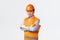 Building sector and industrial workers concept. Confident serious-looking asian chief engineer, architect in helmet and