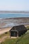 Building on shore Holy Island, view to mainland