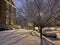 Building, Sidewalk and Street at Night During the January Snowstorm