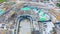 Building site of the arena stadium, flying over a construction site aerial top view