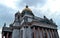 The building in style of classicism. Facade, exterior with columns, sculpture, statues and relief. Isaac`s Cathedral Gold dome
