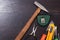 Building tools on wooden background, repair kit, bright screwdrivers, hammer, utility knife,