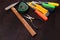 Building tools on wooden background, repair kit, bright screwdrivers, hammer, utility knife,