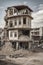 a building is torn down and lying on the ground. demolished building at the centre of the city