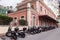 Building of train station and parked motorbikes at Santa Margherita Ligure town, Italy