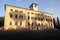 Building with trees shadow above facade (Rome, Italy)