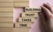 Building Trust takes Time symbol. Wooden blocks with words Building Trust takes Time. Beautiful pink background. Businessman hand