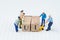 Building UI, User Interface concept, miniature people figure, workers, engineers building or moving wooden stamp block to arrange