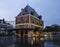 Building Waag at dusk in the center of old city leeuwarden in fr