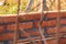 Building a wall with red brick. Working with bricks for building a wall, Construction tools