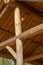 Building wooden crossed round bar hard roof support wooden high rustic shed house