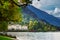 Buildings against the backdrop of Alpine mountains on the shore of lake Como in Northern Italy. cenic landscapes of Lago