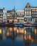 Buildings along the Amsterdam Canals at twilight