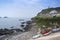 Buildings and boats in the traditional Cape Cornwall landscape i