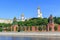 Buildings of churches on the territory of Moscow Kremlin against blue sky in sunny summer morning