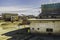 Buildings and cranes under the sunlight in the Riotinto Mines in Huelva in Spain