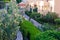 Buildings with green shrubs and flowerbeds